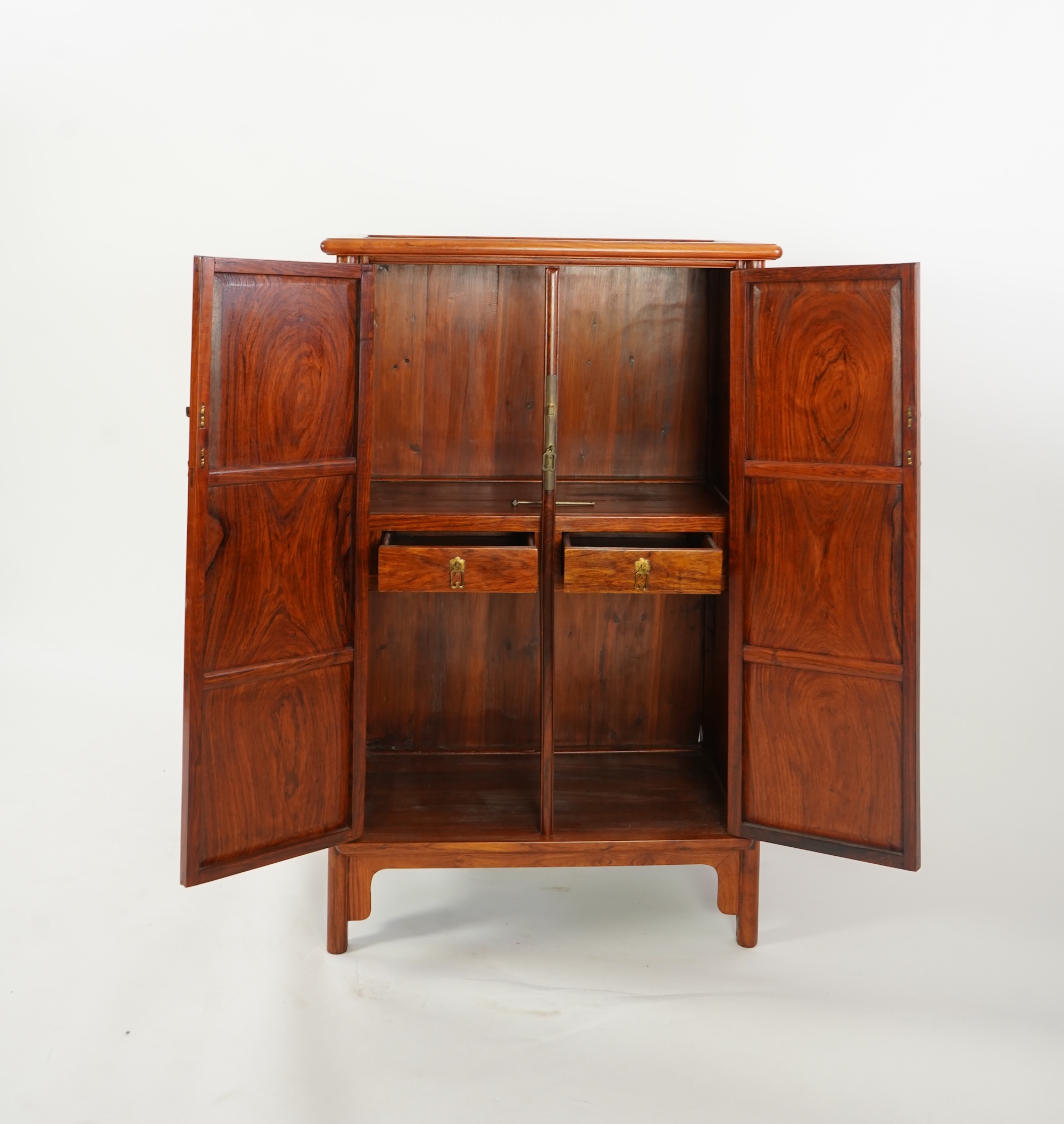 A Chinese huanghuali round-corner cabinet, yuanjiaogui, 19th/20th century